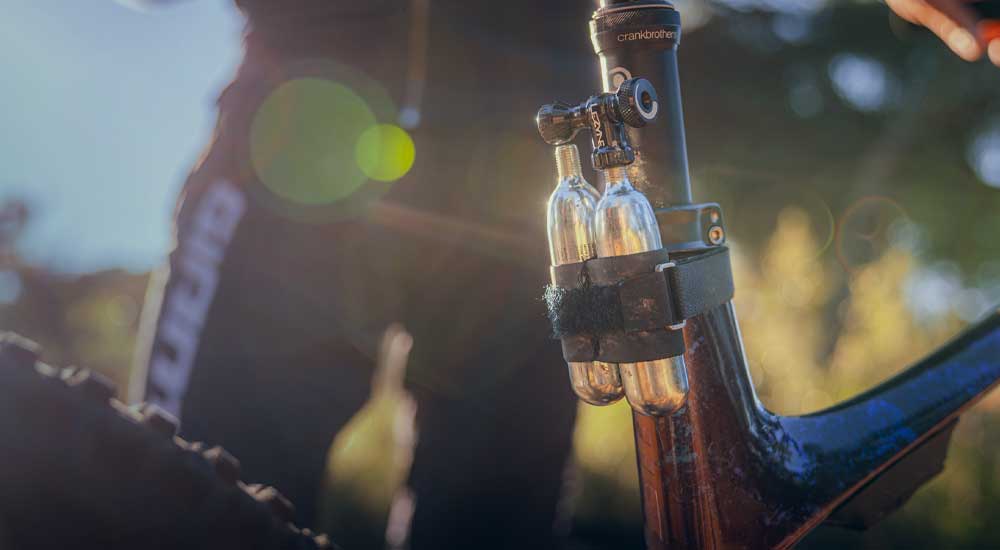 Compact and ready to go — Control Drive CO2 mounts easily and stays within reach for any trail emergency.
