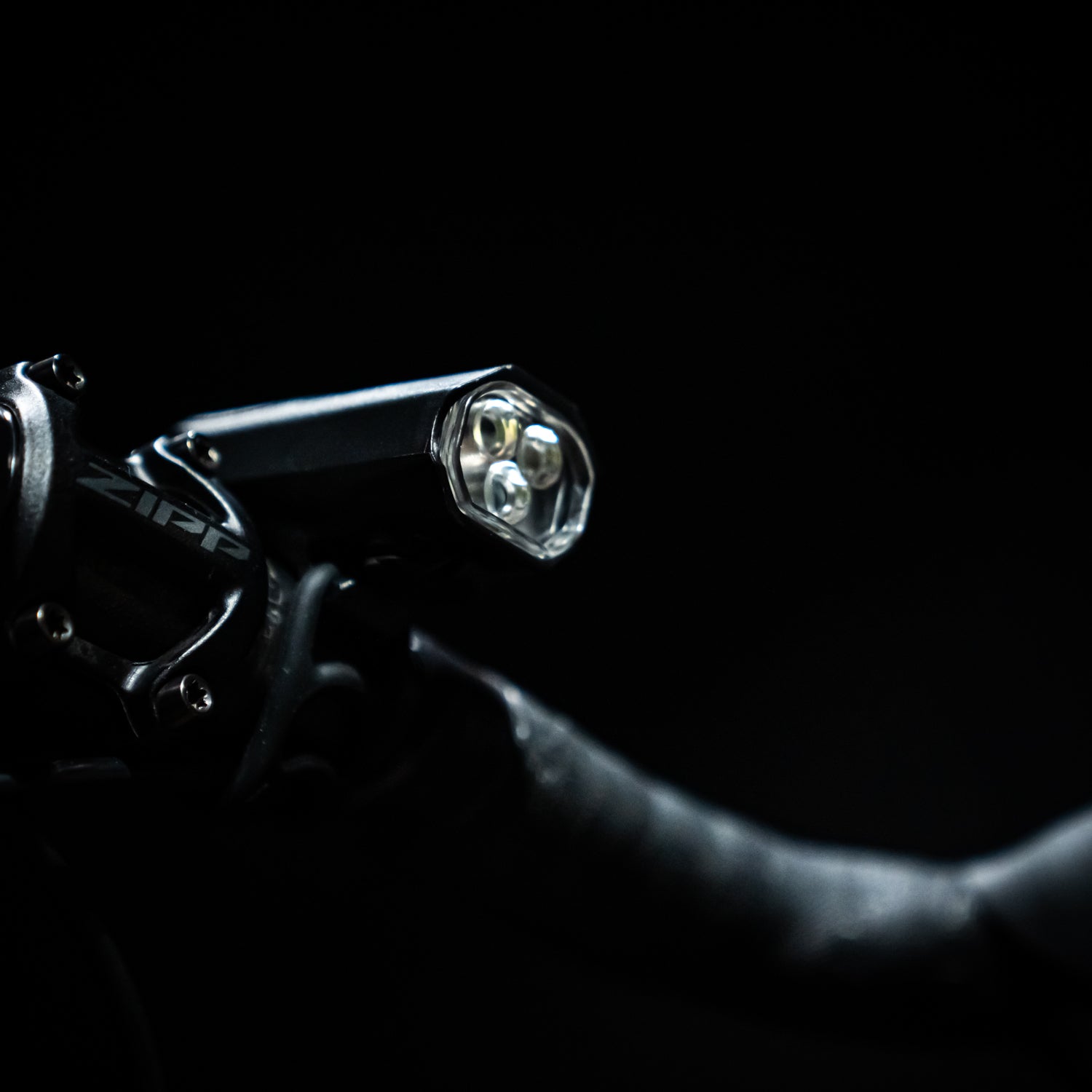Lezyne KTV Drive Pro 300+ LED front bike light mounted on a road bike handlebar for enhanced night visibility and safety.