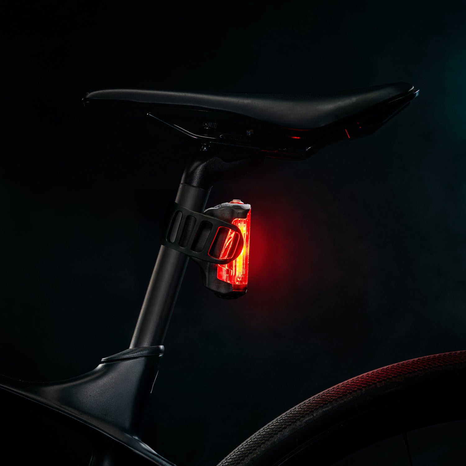 Lezyne Radar Drive LED rear bike light, side view showing engineered optics for 270° visibility and slim, co-molded build.