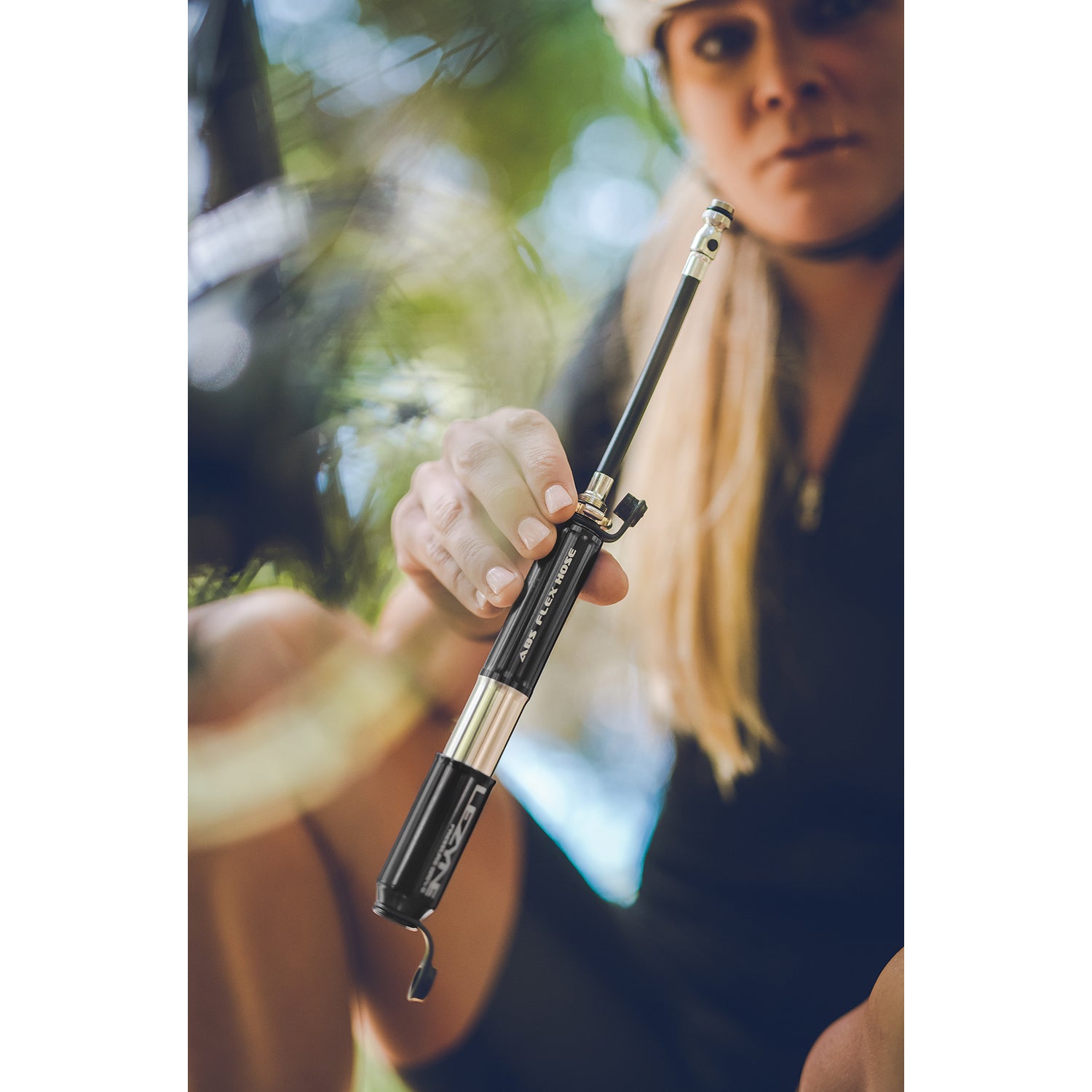 Pressure Drive bike hand pump highlighting portability and lightweight design for road cyclists.