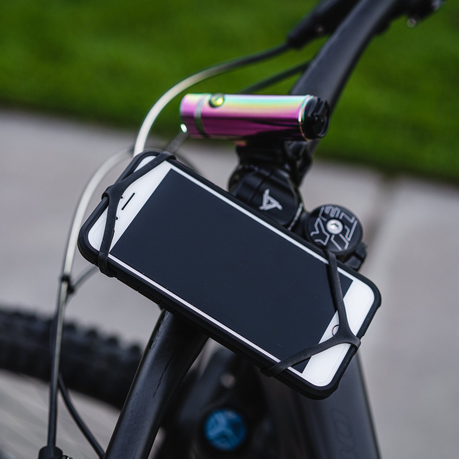 Smart Grip Mount by Lezyne with soft anti-slip frame and flexible band for easy smartphone mounting during bicycle rides.