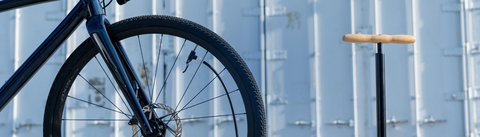Lezyne high-performance floor pump providing precise tire inflation for road bikes, designed for durability and easy use.