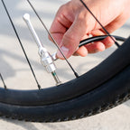 Close-up of the Lezyne Presta Pro Chuck securely attached to a Presta valve