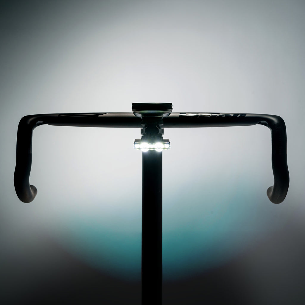 Road Drive 500 mounted to a road bike handlebar for sleek front light setup.