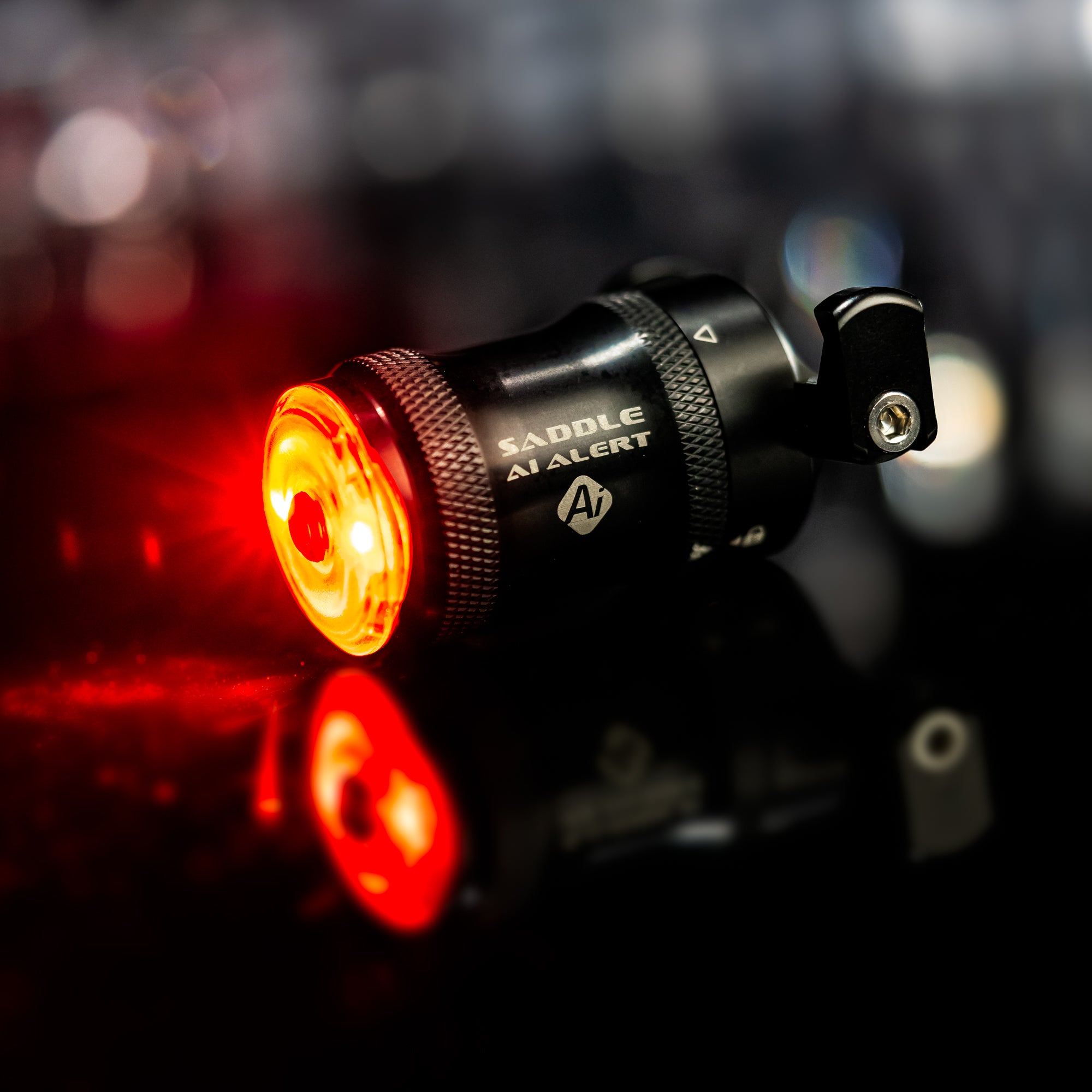 A front side view of the AI Alert light on a shiny dark surface.