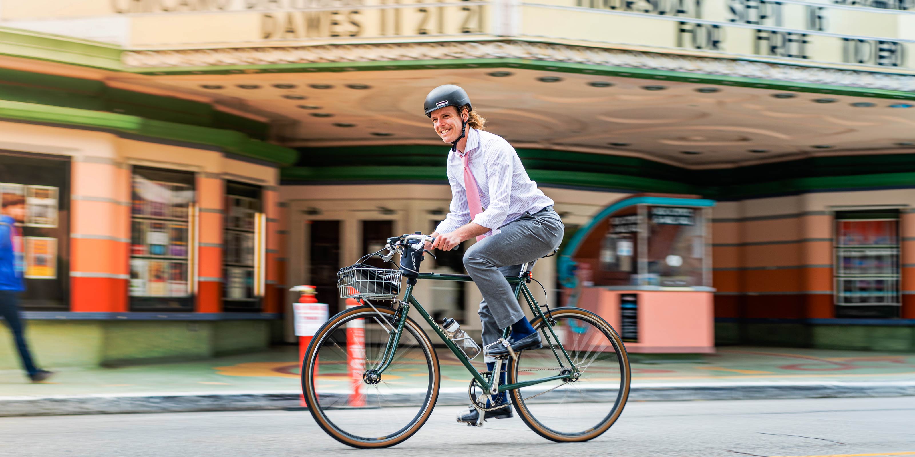 Commuter riding through town