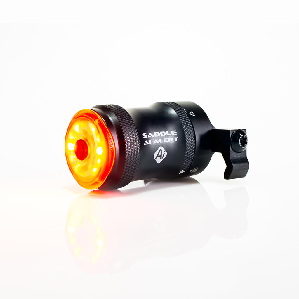 SADDLE Ai ALERT 250 LED rear bike brake light, illuminated, the best choice for safe cycling adventures.