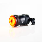 SADDLE Ai ALERT 250 LED rear bike brake light, illuminated, the best choice for safe cycling adventures.
