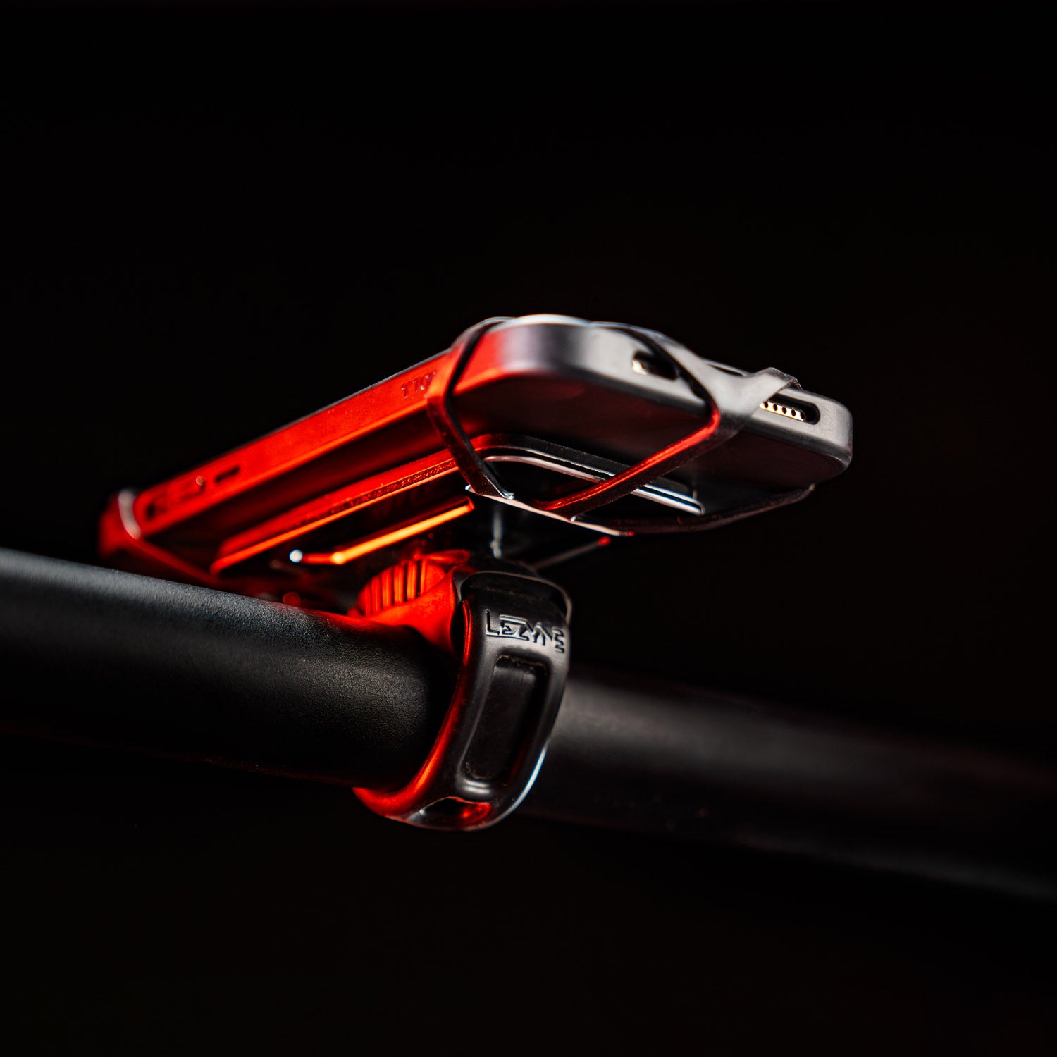 Lezyne Smart Grip Phone Mount with versatile strap system, securely holding smartphones on any style of bicycle handlebar.