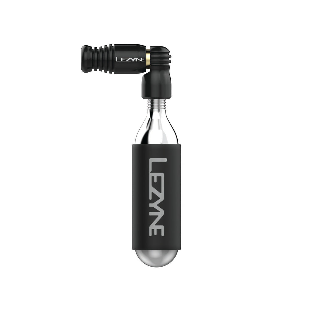 Side view of black Trigger Speed Drive CO2 inflator, showing sleek design with neoprene sleeve and Presta valve compatibility.