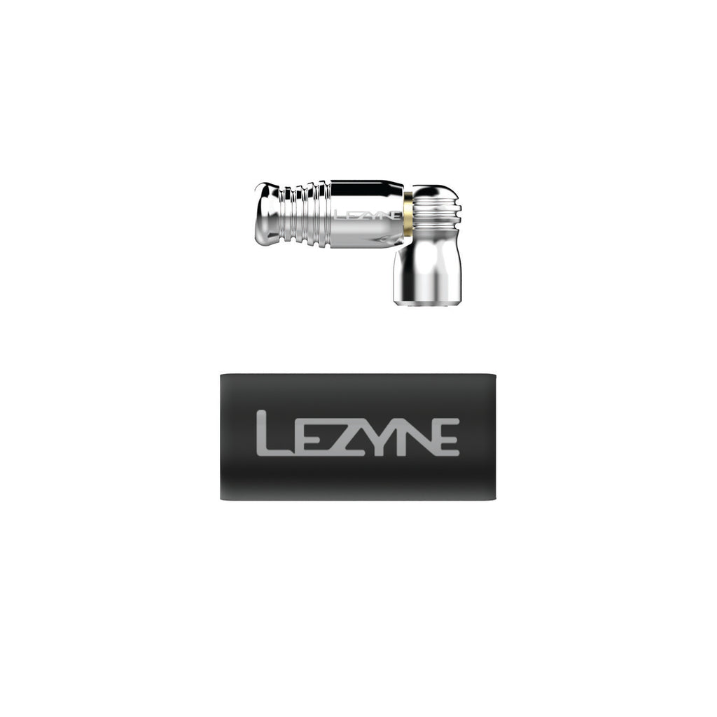 Minimalist silver CO2 inflator head with precision trigger valve and hand-insulating neoprene sleeve for CO2 cartridge.