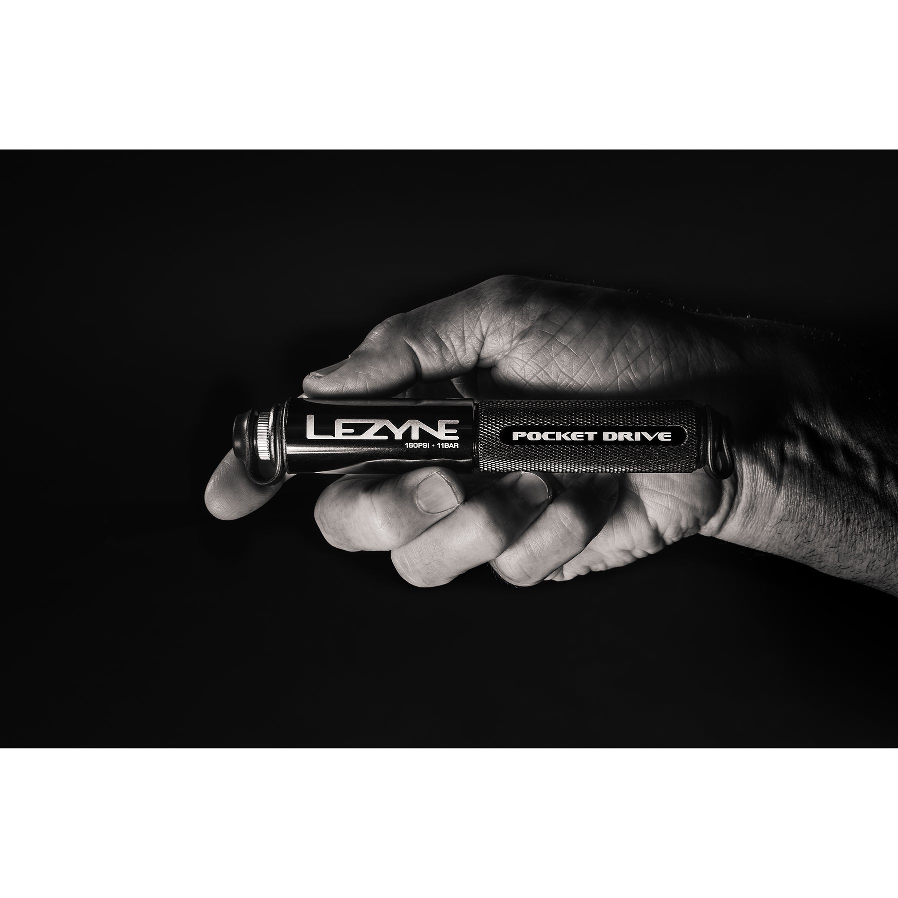 Lezyne Pocket Drive portable bike pump with Presta/Schrader adaptability, robust rebuildable design, and precision inflation power.