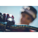 Purple Hecto Drive 500XL front bike light on a mountain bike